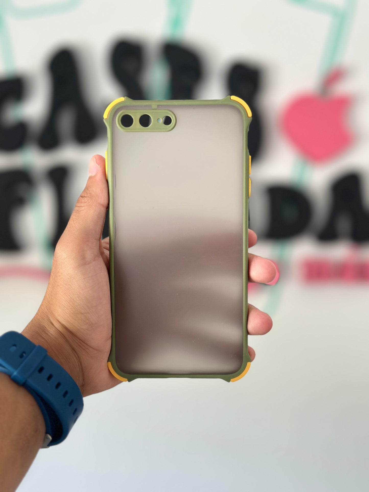 Case con bordes reforzados, verde con amarillo